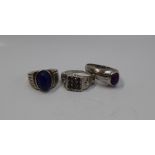 A Gentleman's 9ct white gold signet ring, set with an oval cabochon amethyst, size Y 1/2,