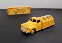 A Dinky Toys diecast model of a Tanker "National Benzole", with a yellow body and yellow hubs, No.