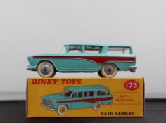 A Dinky Toys diecast model of a Nash Rambler, with a turquoise body, dark red flash,