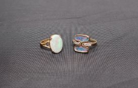 An opal ring, the oval opal 15mm x 11mm to a claw setting on a 22ct gold shank, 6 grams,