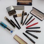 A Ronson Penciliter, cased together with a collection of fountain pens including Parker, Summit,