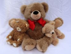 A Steiff Fynn teddy bear together with two other plush Steiff teddy bears