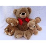 A Steiff Fynn teddy bear together with two other plush Steiff teddy bears