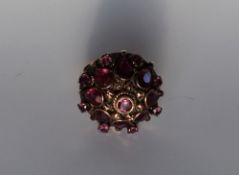 A ruby dress ring,