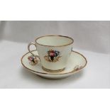 A Swansea porcelain teacup and saucer, with basket weave design, painted with cornucopia of flowers,