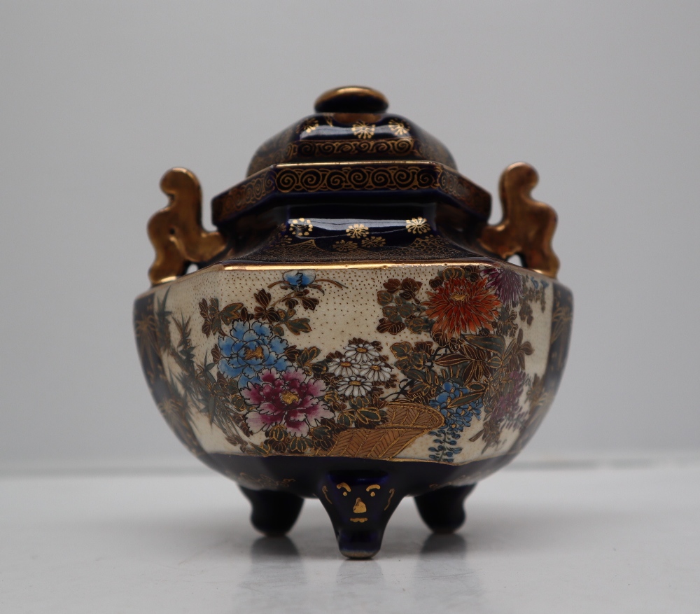 A Japanese satsuma pottery potpourri twin handled vase and cover, of hexagonal form,