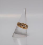 An 18ct yellow gold gypsy ring set with five graduated old round cut diamonds, size K 1/2,