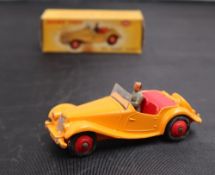 A Dinky Toys diecast model of an M.G.
