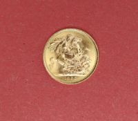An Elizabeth II gold Sovereign,