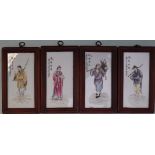 A set of four Chinese porcelain panels depicting figures in traditional dress, 24 x 11.