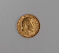 An Edward VI Gold sovereign dated 1902,