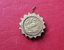 A George V gold sovereign, dated 1912, Melbourne mint mark, in a 9ct yellow gold slip mount,