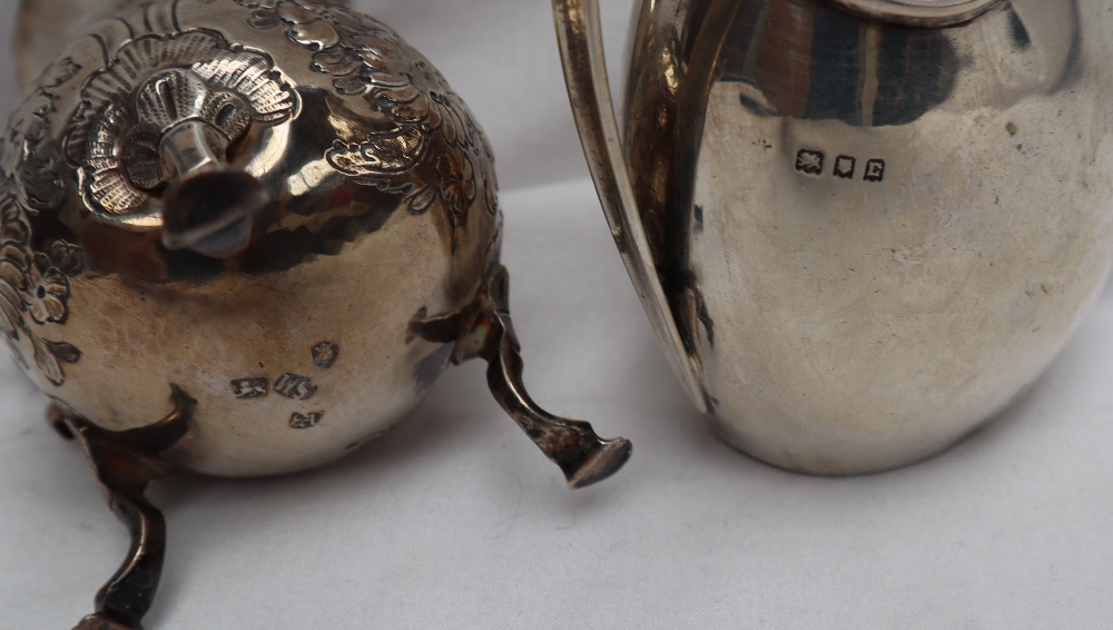 A George V silver cream jug with a scrolling handle, Sheffield, 1918, - Image 2 of 2