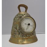 A French brass barometer in the form of a bell,