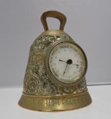 A French brass barometer in the form of a bell,