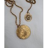 A 9ct yellow gold locket of circular form,