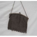 A white metal mesh purse,