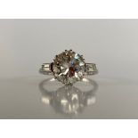 A solitaire diamond ring, the round brilliant cut diamond approximately 3cts,