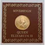 An Elizabeth II gold sovereign,