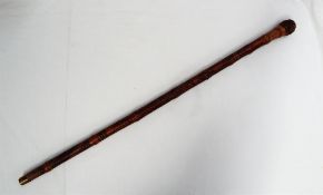 A Japanese bamboo walking stick, with a root knop handle, the body carved with a figure, eagle,