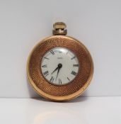 A yellow metal half hunter pocket watch, the white enamel dial with Roman numerals,