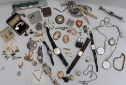 Assorted costume jewellery including a cameo brooch, other brooches,