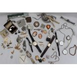 Assorted costume jewellery including a cameo brooch, other brooches,