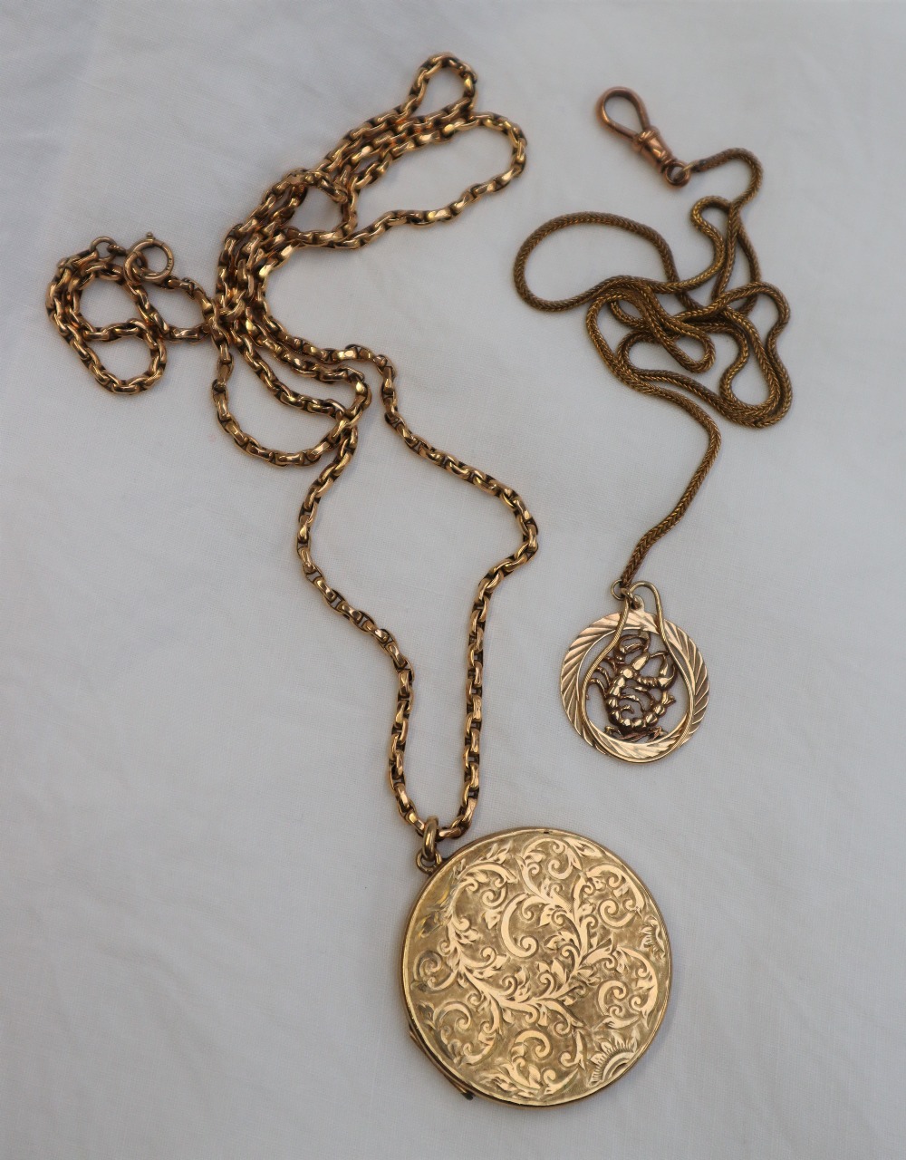 A 9ct yellow gold locket of circular form, - Image 2 of 3