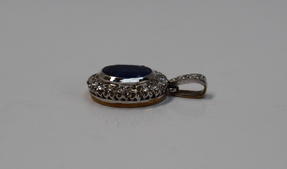 A cornflower blue sapphire and diamond cluster pendant, - Image 3 of 4