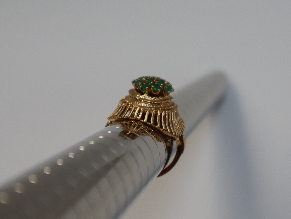 A 14ct yellow gold dress ring, set with a cluster of light green stones, possibly peridot, - Image 6 of 6
