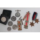 Two World War II Medals comprising the 1939-1945 Star and the Africa Star together with a Festival