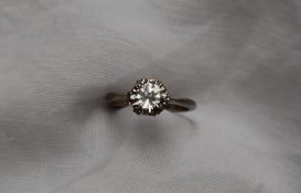 A solitaire diamond ring, the round brilliant cut diamond approximately 0.