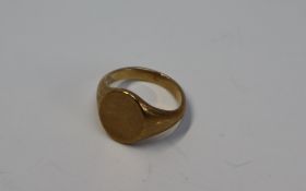 A 9ct yellow gold signet ring, size M, approximately 6.