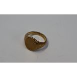 A 9ct yellow gold signet ring, size M, approximately 6.