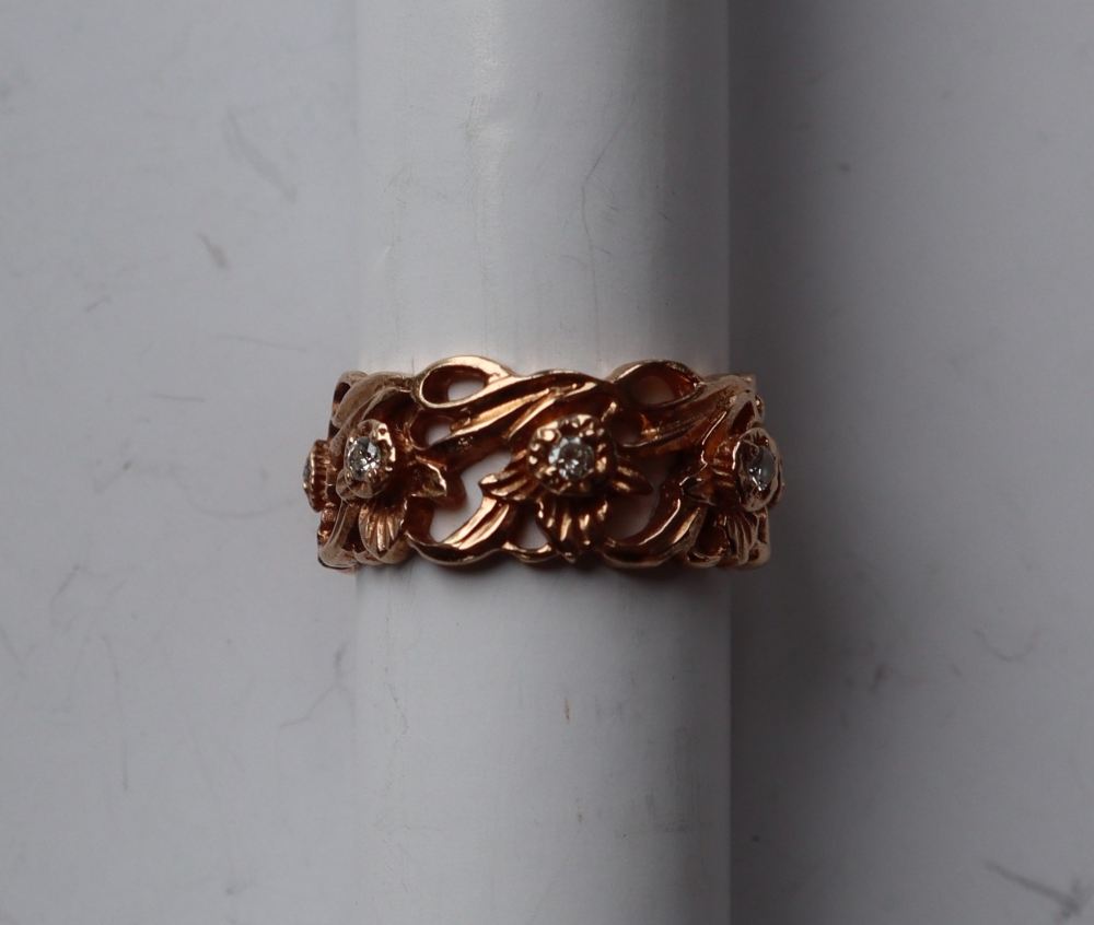 A 14ct yellow gold ring pierced with flowers and leaves set with round brilliant cut diamonds, - Image 2 of 6