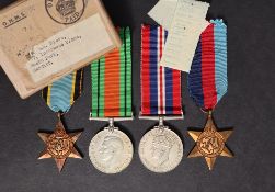 Four World War II medals comprising The British War Medal, The Defence Medal,