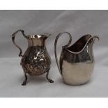 A George V silver cream jug with a scrolling handle, Sheffield, 1918,