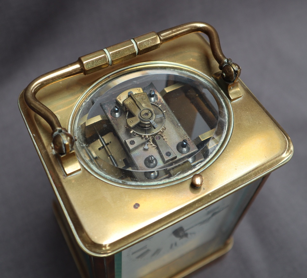 A French brass carriage clock, with a shaped handle and insight platform escapement, - Image 2 of 5