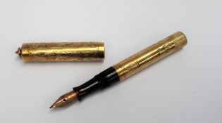 A Waterman self filling gilt metal fountain pen, with suspension ring,