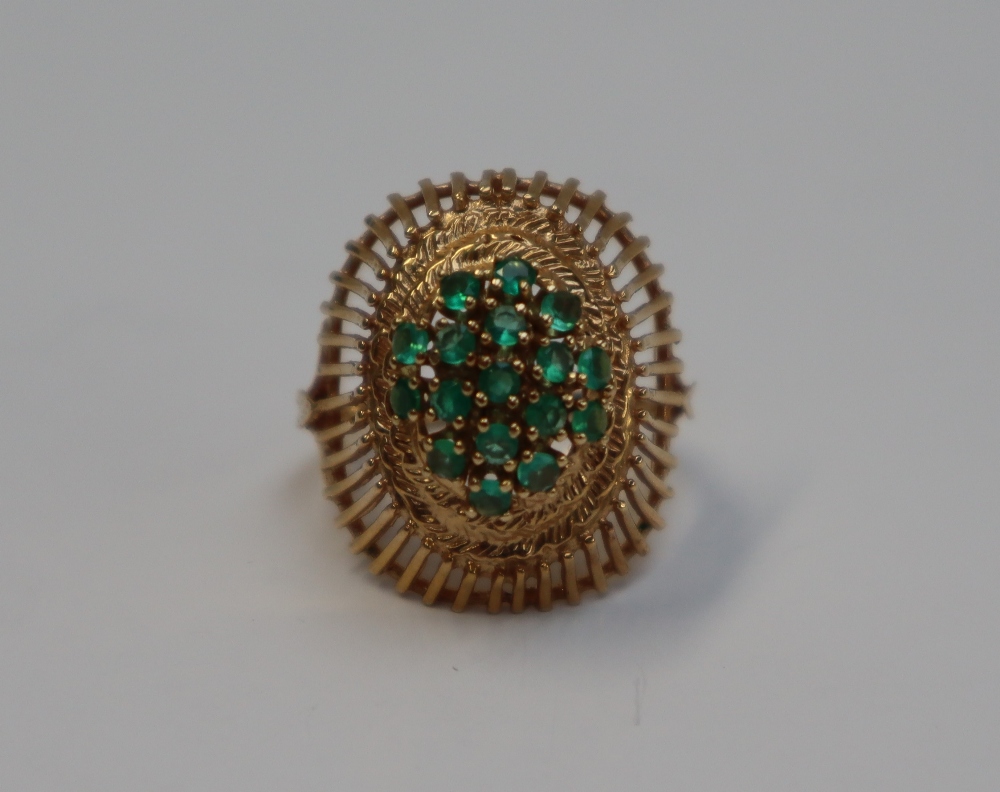 A 14ct yellow gold dress ring, set with a cluster of light green stones, possibly peridot, - Image 2 of 6