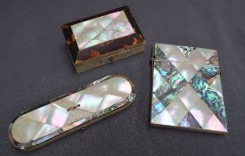 A mother of pearl and abalone shell card case 10.