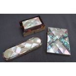 A mother of pearl and abalone shell card case 10.