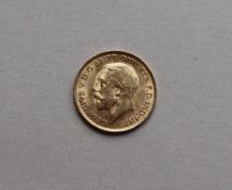 A George V gold half sovereign,