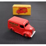 A Dinky Toys diecast model of a Trojan 15 CWT Van "Dunlop", with a red body and red hubs, No.