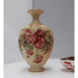 A Royal Worcester porcelain single stem vase, decorated with flowers and leaves to an ivory ground,