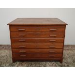 A 20th century oak plan chest, the rectangular top above six drawers on square legs,