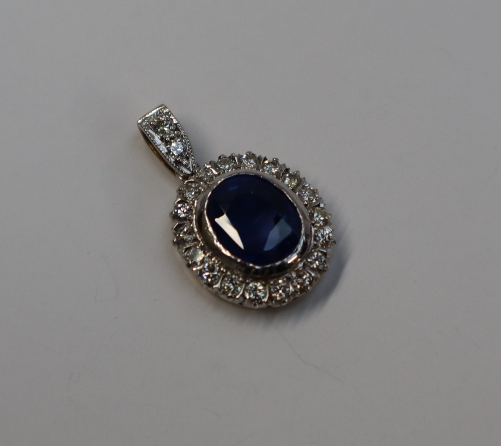 A cornflower blue sapphire and diamond cluster pendant, - Image 2 of 4