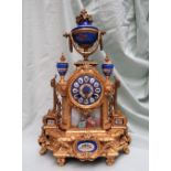 A 19th century French gilt spelter and porcelain plaque inset mantle clock,