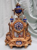 A 19th century French gilt spelter and porcelain plaque inset mantle clock,