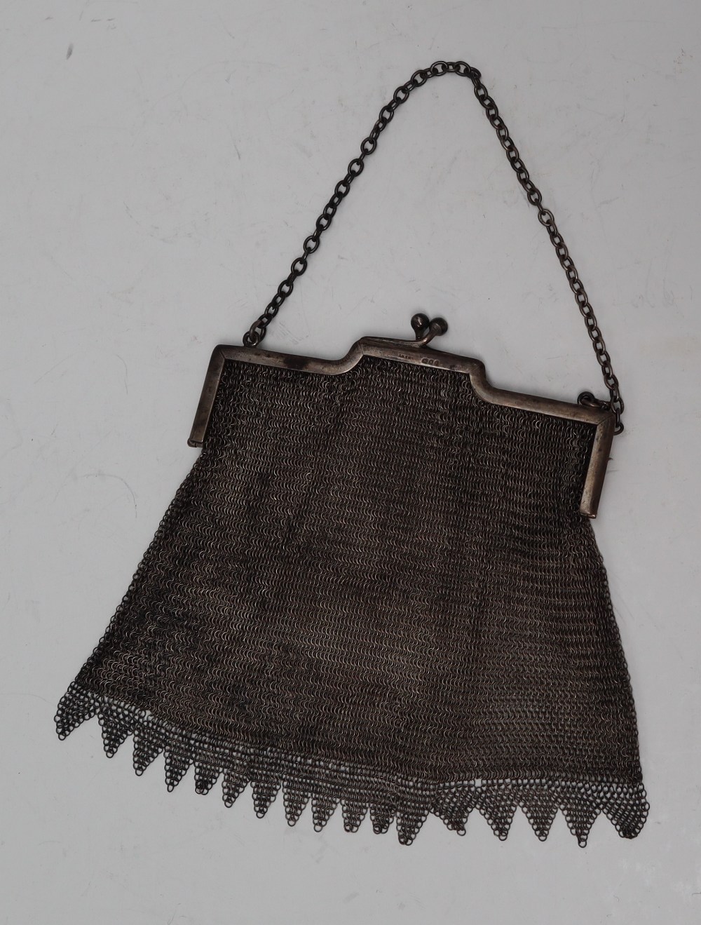 A George V silver purse, with a squared top and mesh purse, London, 1921, 12.